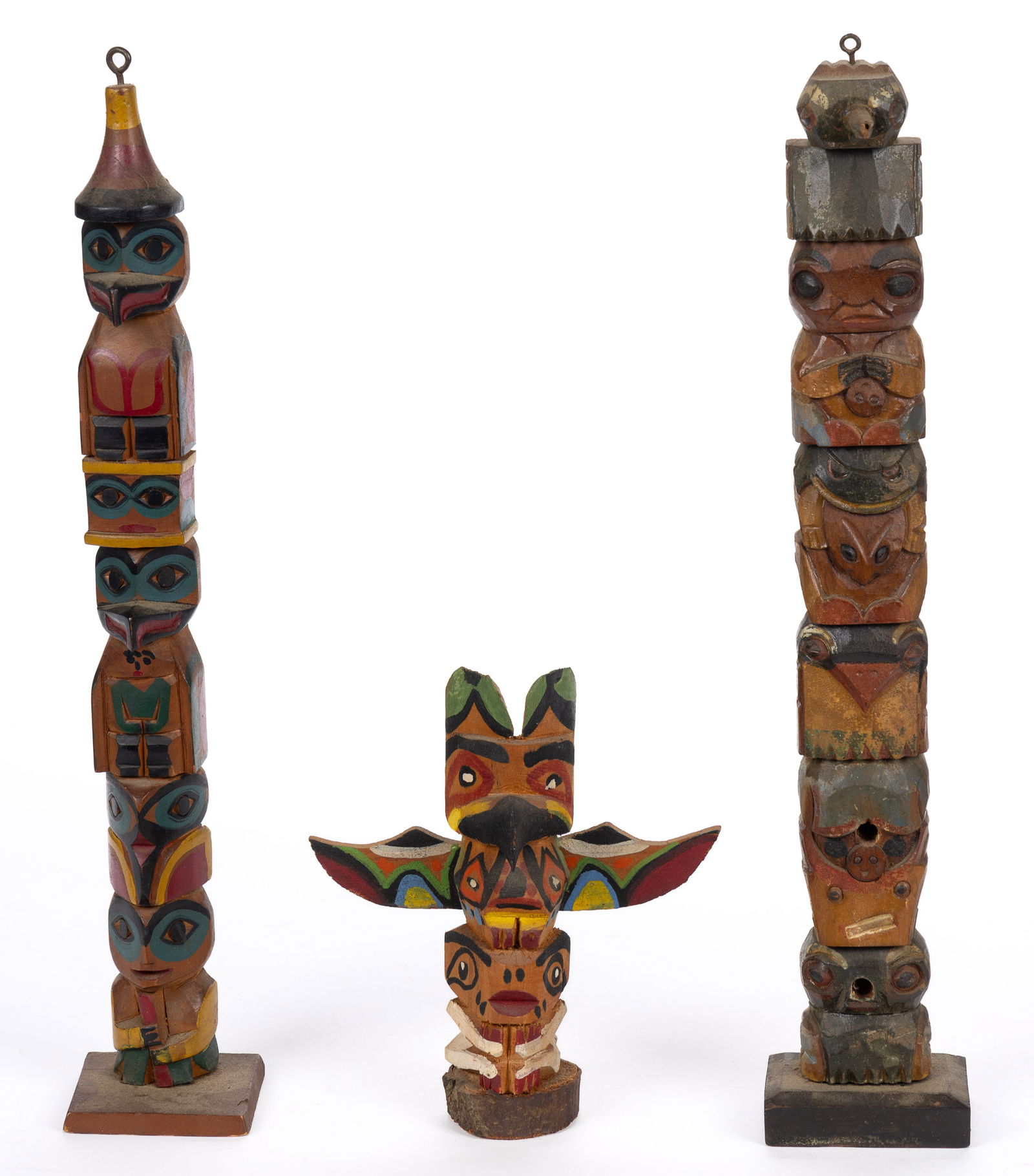 NORTHWEST COAST NATIVE AMERICAN AND POLYCHROME-PAINTED TOTEM POLES, LOT OF THREE (1 of 5)