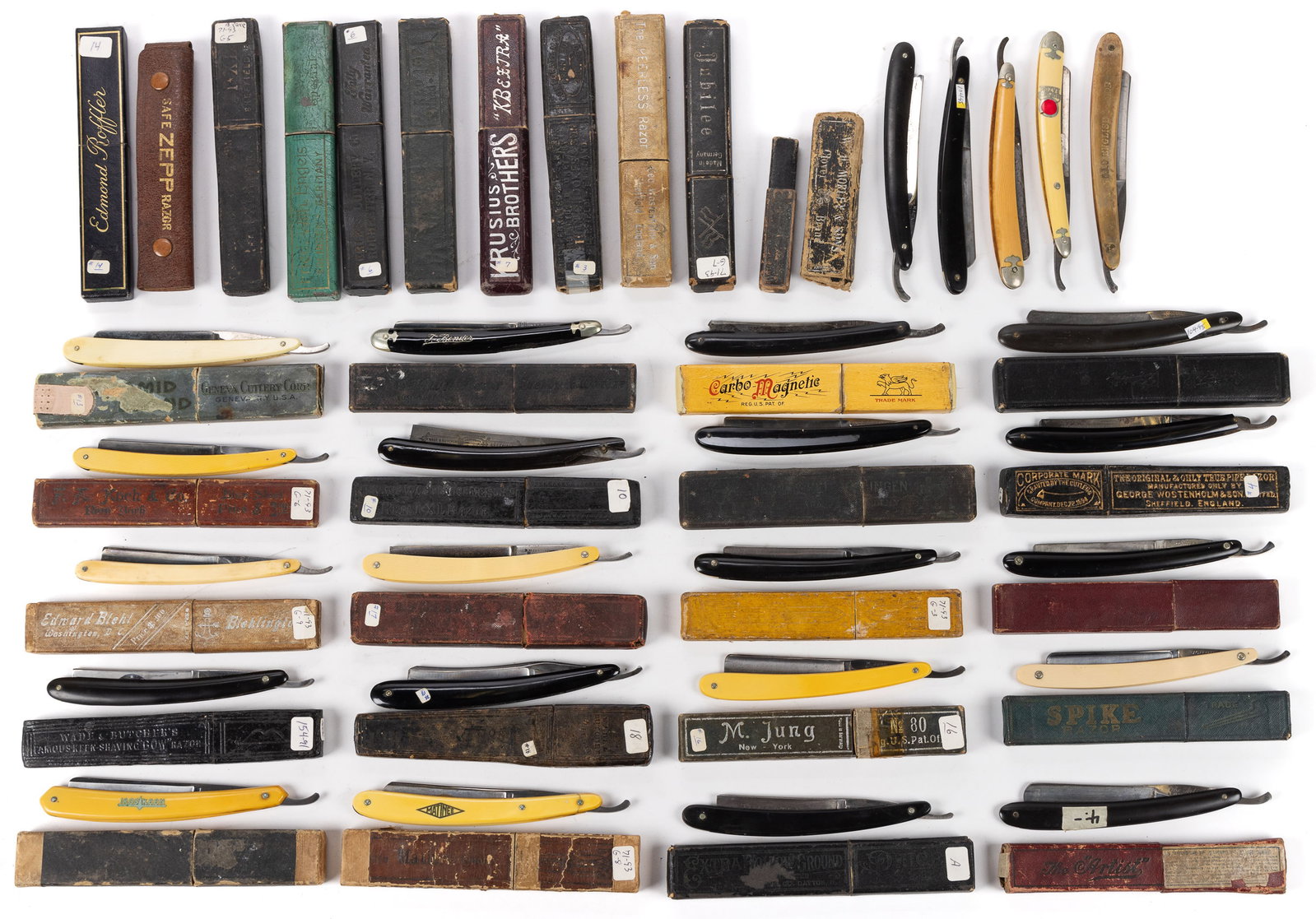 ASSORTED STRAIGHT RAZORS AND ASSOCIATED BOXES, UNCOUNTED LOT: ASSORTED STRAIGHT RAZORS AND ASSOCIATED BOXES, UNCOUNTED LOT, including examples from Zepp; Edmond Roffler; and Jubilee; with associated boxes. 19th and 20th century. Longest razor 6 1/2" LOA. Pr