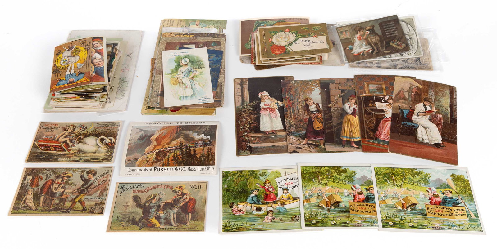 LITHOGRAPHED ADVERTISING TRADE CARDS, LARGE UNCOUNTED LOT: LITHOGRAPHED ADVERTISING TRADE CARDS, LARGE UNCOUNTED LOT, including sewing machines, thread, soaps, baking powders, medicines, etc. Fourth quarter 19th century. 7 3/4" x 5" OA. Provenance:
