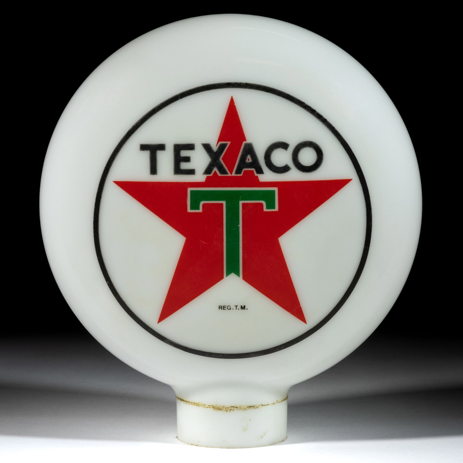 TEXACO ADVERTISING ONE-PIECE MILK GLASS GAS PUMP GLOBE: TEXACO ADVERTISING ONE-PIECE MILK GLASS GAS PUMP GLOBE, retaining strong color. Mid 20th century. 13 1/2" HOA, 12" DOA. Provenance: Collection of the late Al and Billy Steidel, Alexandria, V