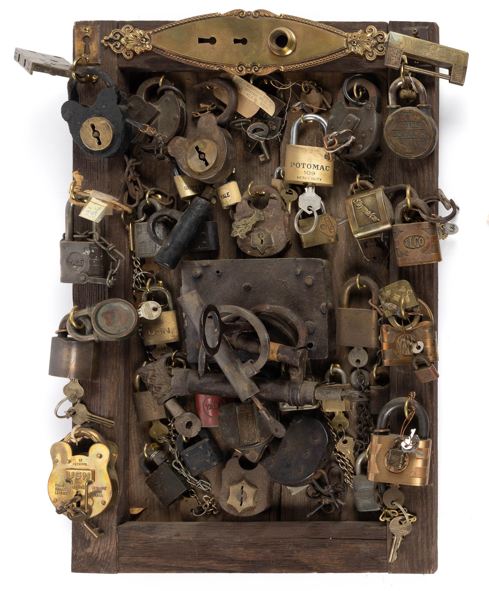 ASSORTED PADLOCKS AND OTHER LOCKS / ACCESSORIES, UNCOUNTED LOT: ASSORTED PADLOCKS AND OTHER LOCKS / ACCESSORIES, UNCOUNTED LOT, collection is creatively mounted on an oak panel with hooks etc. to keep them attached, includes an iron box lock with key, padlocks suc