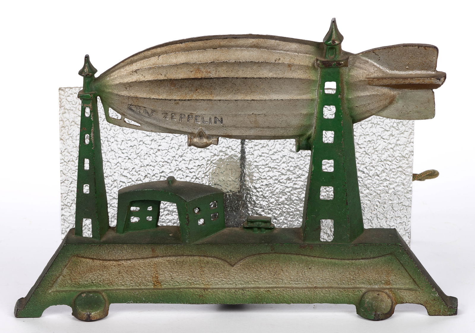 SCHYLLING ATTRIBUTED GRAF ZEPPELIN AIR SHIP CAST-IRON RADIO / TV LAMP: SCHYLLING ATTRIBUTED GRAF ZEPPELIN AIR SHIP CAST-IRON RADIO / TV LAMP, retains original polychrome surface with minimal paint loss; glass appears to be original with very minor edge chipping