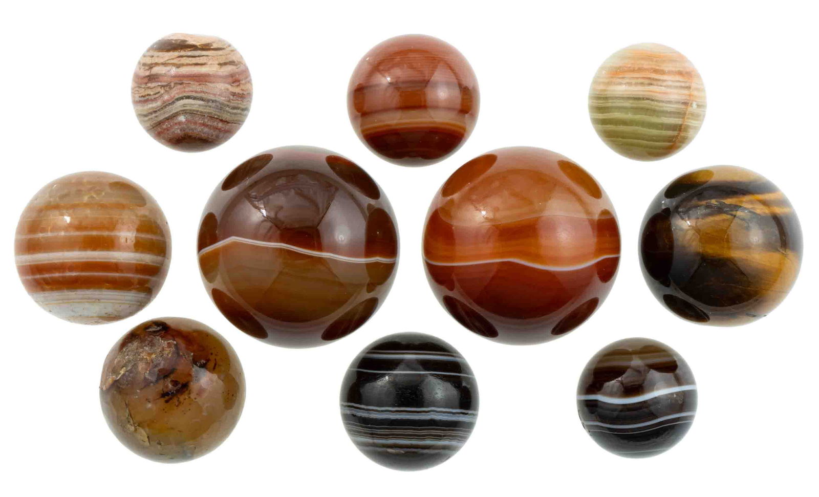 ASSORTED STONE MARBLES, LOT OF TEN: ASSORTED STONE MARBLES, LOT OF TEN, including agate examples. Various makers. 20th century. 1/2" to 1" D. Provenance: Collection of the late Al and Billy Steidel, Alexandria, VA.