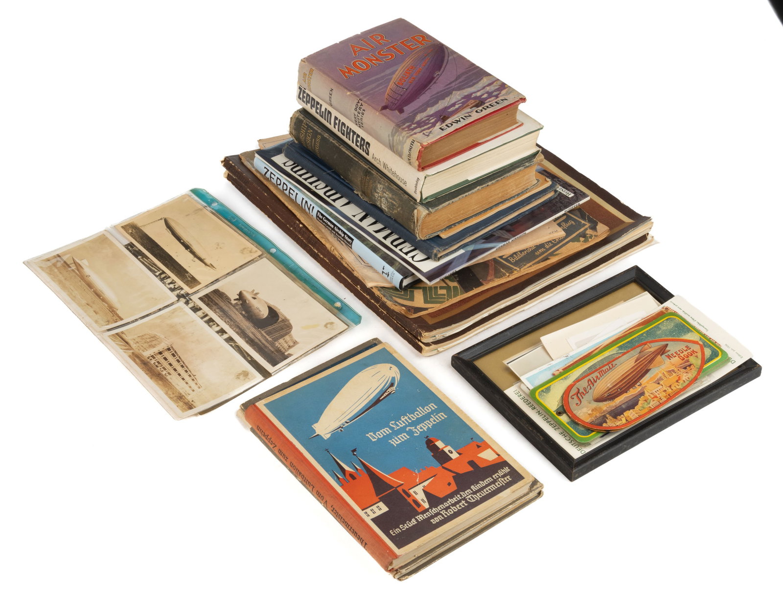 VINTAGE AIR BALLOON / ZEPPELIN BOOKS AND EPHEMERA, UNCOUNTED LOT: VINTAGE AIR BALLOON / ZEPPELIN BOOKS AND EPHEMERA, UNCOUNTED LOT, including four real-photo and six printed post cards, assorted photos, two felts, a needle book, assorted hard and soft cover books, e