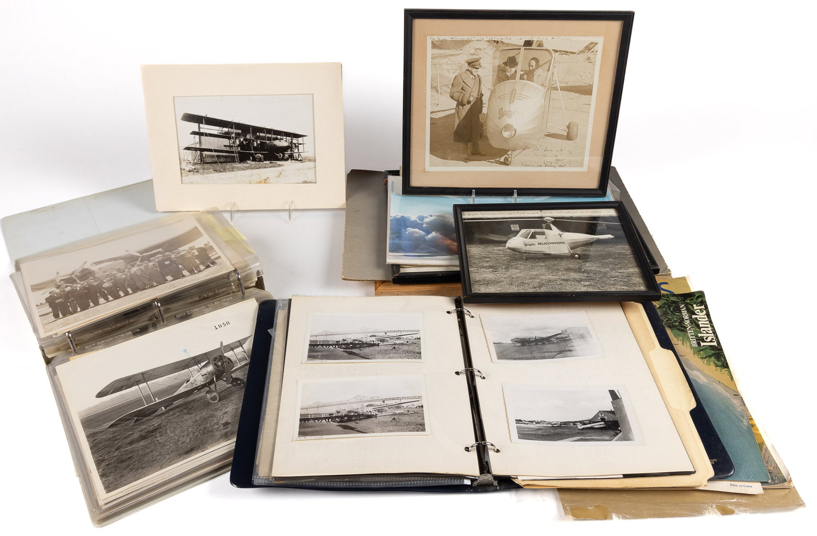 ASSORTED AERONAUTICAL PHOTOGRAPHS AND EPHEMERA, UNCOUNTED LOT: ASSORTED AERONAUTICAL PHOTOGRAPHS AND EPHEMERA, UNCOUNTED LOT, military and commercial aircraft, including an album with many photos stamped for Max Karant, Evanston, IL; an album with photo
