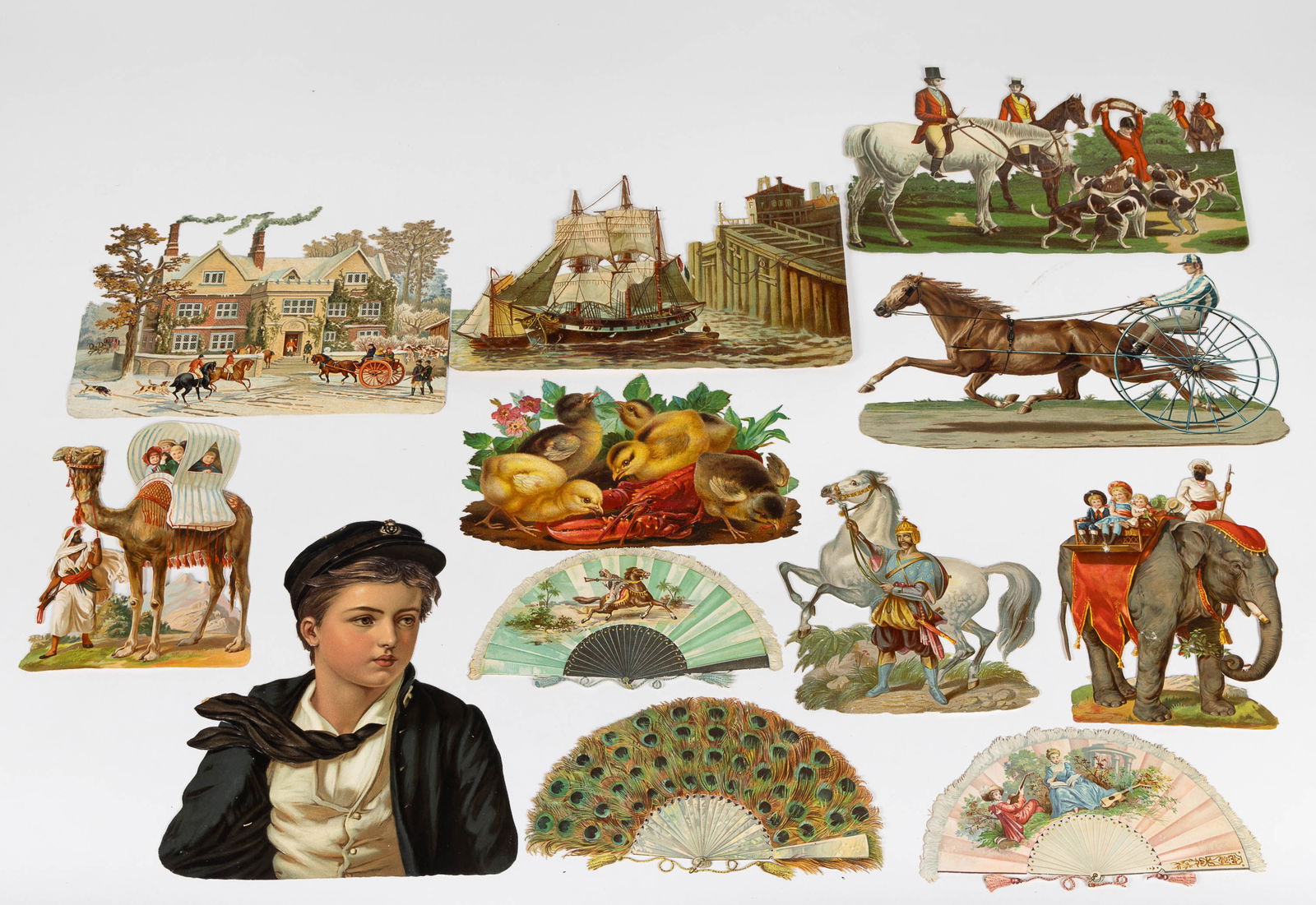 VICTORIAN LITHOGRAPHED LARGE-SIZE DIE-CUTS, LOT OF 12: VICTORIAN LITHOGRAPHED LARGE-SIZE DIE-CUTS, LOT OF 12, comprising animals, figures, and structures, including chicks with a lobster, fox hunt, racing horse and surrey, etc. Fourth quarter 19th/early 2
