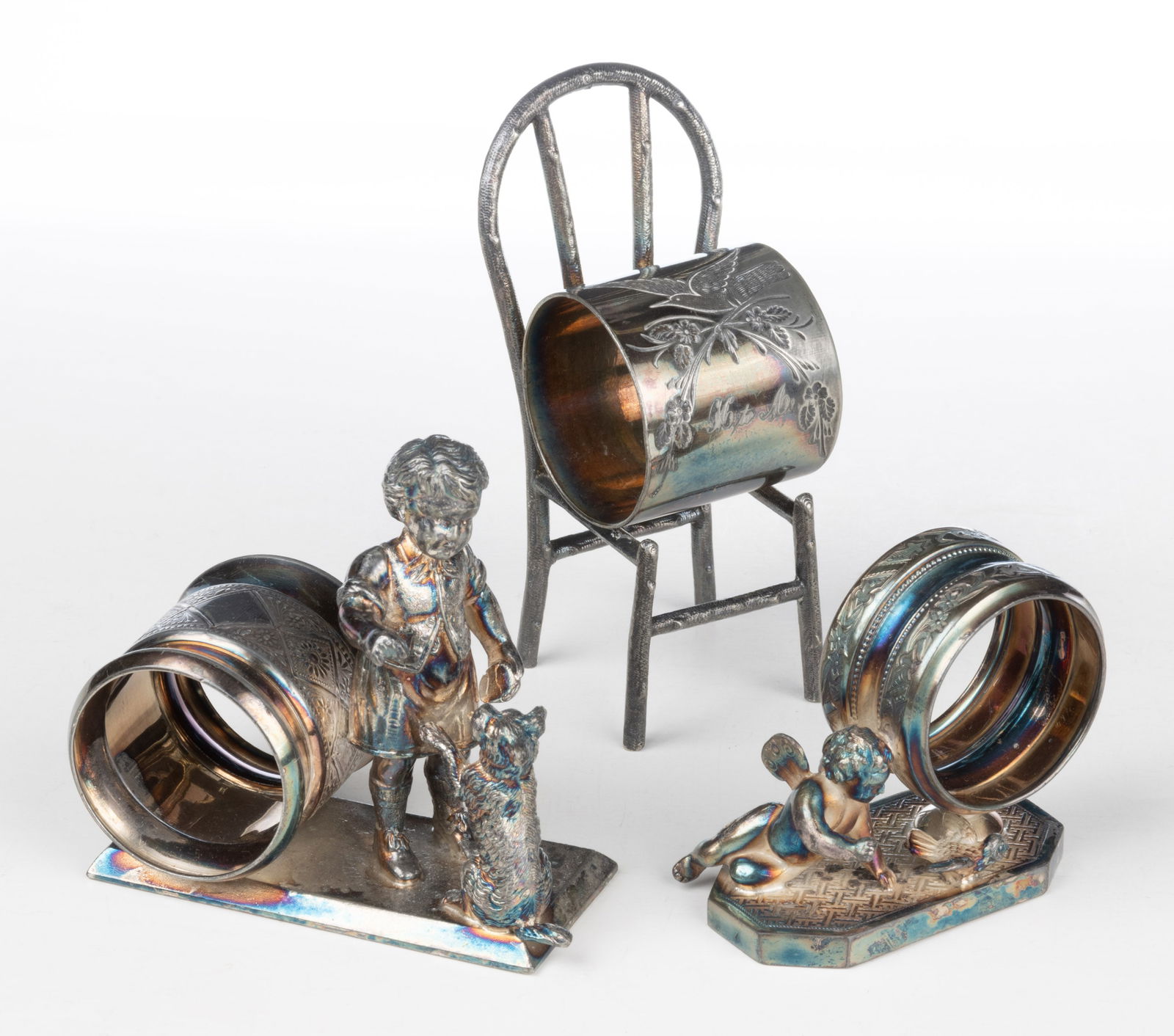 MERIDEN BRITANNIA CO. AND OTHER FIGURAL SILVER-PLATED NAPKIN RINGS, LOT OF THREE (1 of 1)