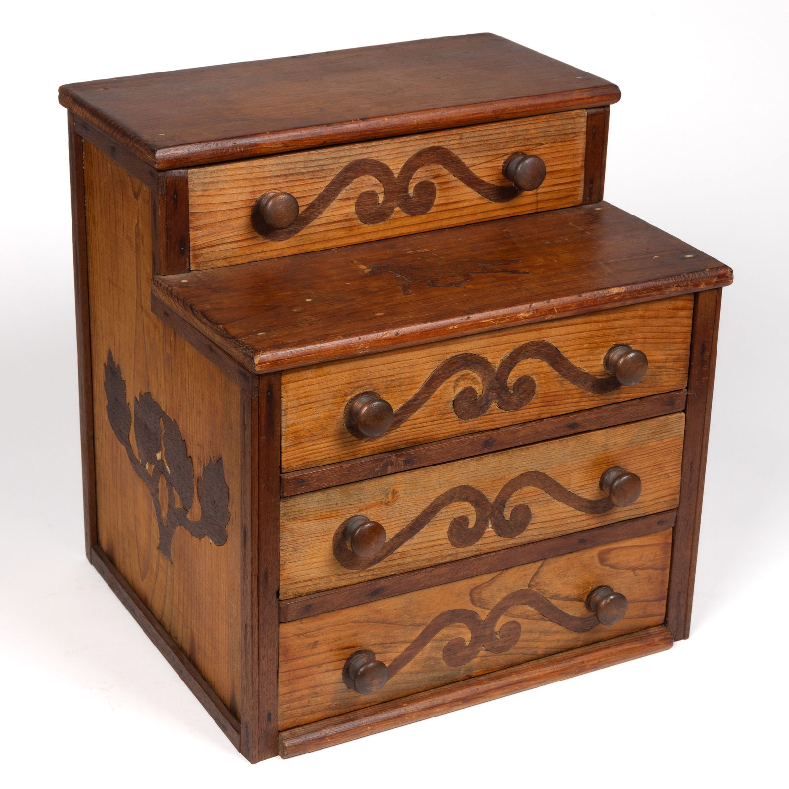 AMERICAN INLAID CHILD'S CHEST: AMERICAN INLAID CHILD'S CHEST, pine with walnut inlay featuring a horse to top, leaves to ends, and scrolls to drawer fronts. American. Fourth quarter 19th century/first quarter 20th century. 15 1