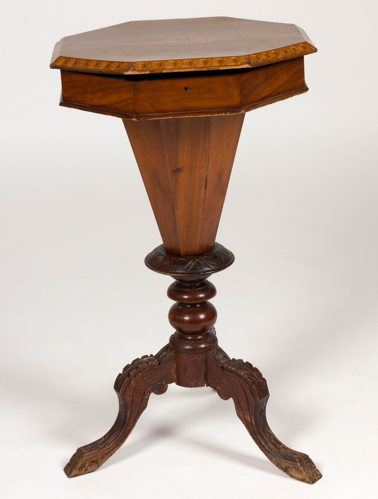 CONTINENTAL PARQUETRY INLAID SEWING STAND TABLE: CONTINENTAL PARQUETRY INLAID SEWING STAND TABLE, octagonal inlaid top featuring floral and geometric inlaid designs opens to reveal a paper-lined interior with an interior well with satin-covered lid,