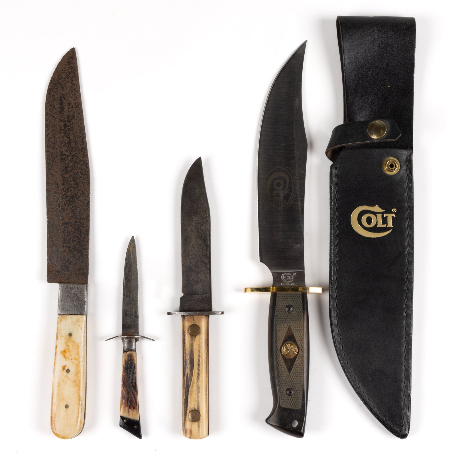 BOWIE-STYLE KNIVES, LOT OF FOUR: BOWIE-STYLE KNIVES, LOT OF FOUR, comprising an unmarked example with bone grips; an unmarked example with antler grips; a small example marked Japan with antler and horn grips; and a Colt 1993 Li