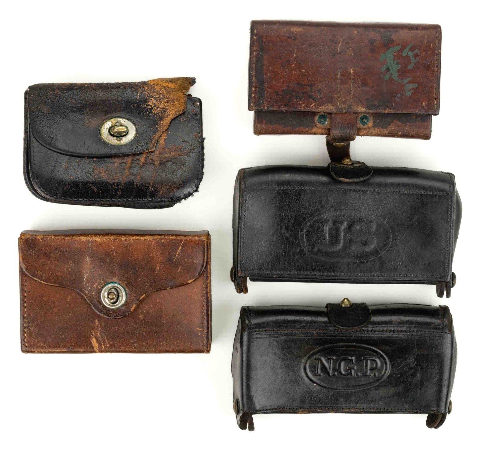 UNITED STATES AND OTHER MILITARY LEATHER BOXES / POUCHES, LOT OF FIVE: UNITED STATES AND OTHER MILITARY LEATHER BOXES / POUCHES, LOT OF FIVE, including two McKeever cartridge boxes, one embossed "N.G.P." to front and with 1873 patent date, J. H. Wilso