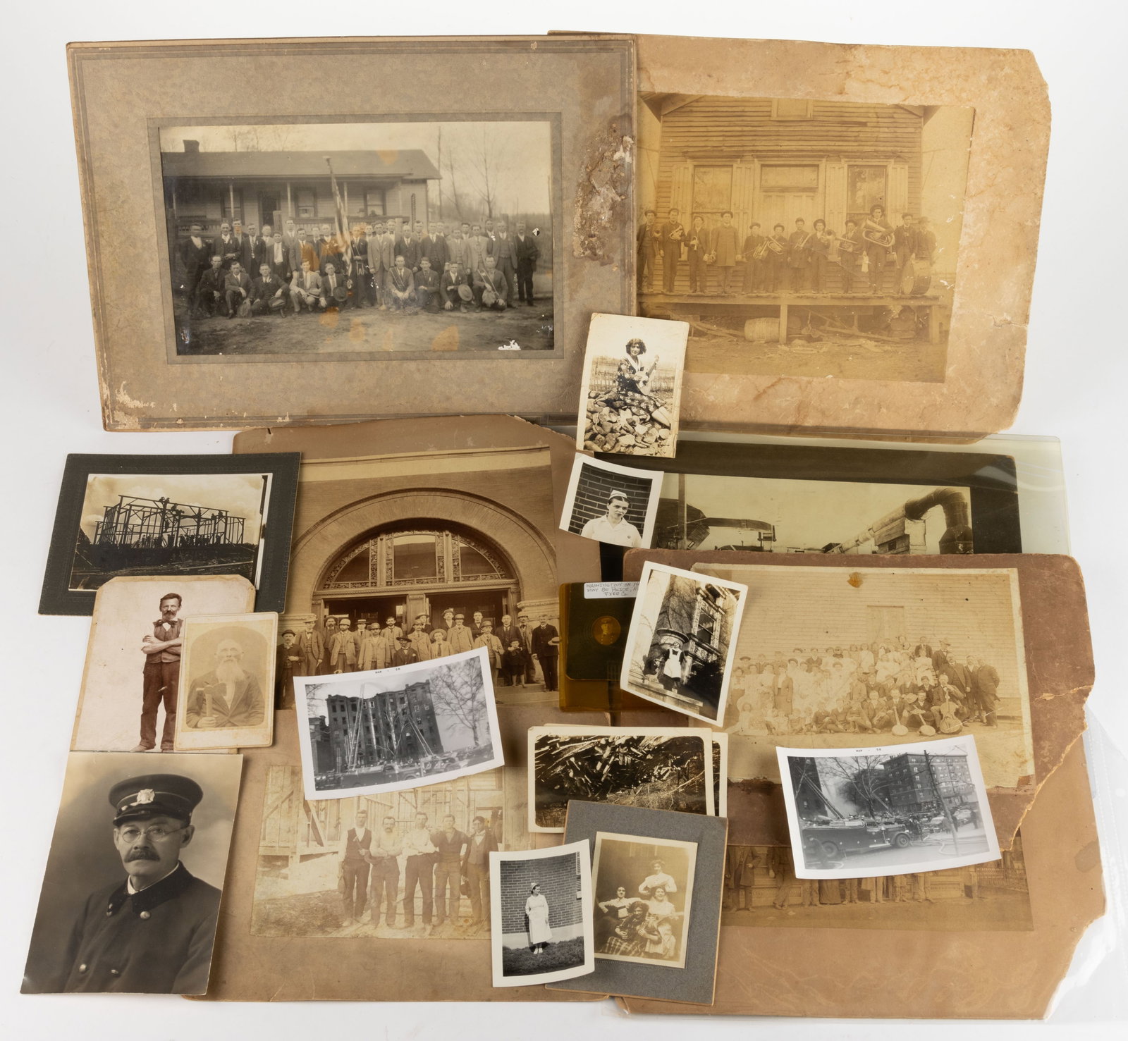ASSORTED ANTIQUE AND VINTAGE MUSIC / OCCUPATIONAL PHOTOGRAPHS, LOT OF 21: ASSORTED ANTIQUE AND VINTAGE MUSIC / OCCUPATIONAL PHOTOGRAPHS, LOT OF 17, including three depicting musicians including an all female group, one example from The Philadelphia Museum featuring African 
