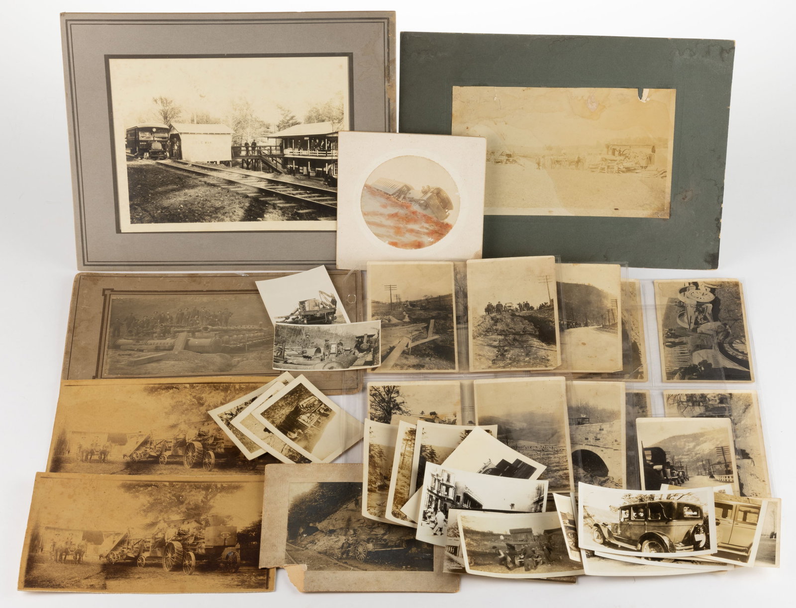 ASSORTED ANTIQUE AND VINTAGE INDUSTRIAL / TRANSPORTATION PHOTOGRAPHS, UNCOUNTED LOT: ASSORTED ANTIQUE AND VINTAGE INDUSTRIAL / TRANSPORTATION PHOTOGRAPHS, UNCOUNTED LOT, more than 40, including three examples depicting a threshing scene with steam engine, one featuring the "