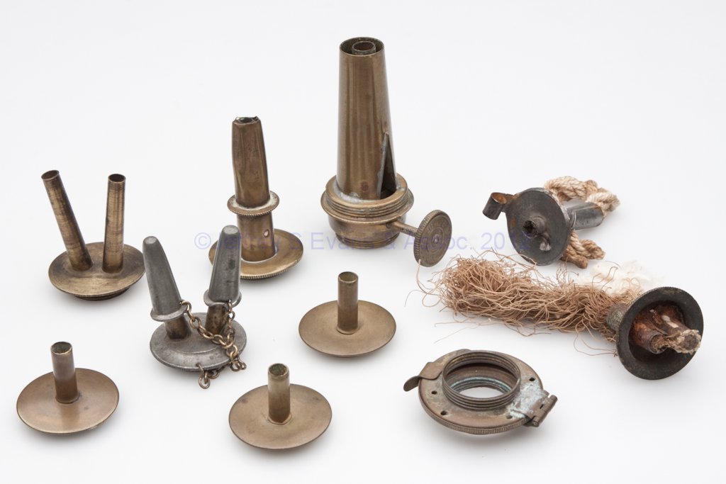 ASSORTED LIGHTING BURNERS AND ACCESSORIES, LOT OF T: ASSORTED LIGHTING BURNERS AND ACCESSORIES, LOT OF TEN, including a pewter and brass double-tube fluid burner with chain and caps, and a R. S. Merrill's brass single-tube fluid burner with sliding oute