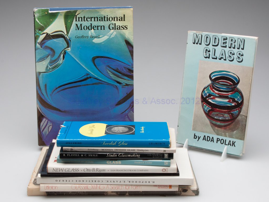 MODERN AND STUDIO GLASS REFERENCE VOLUMES, LOT OF : MODERN AND STUDIO GLASS REFERENCE VOLUMES, LOT OF 11, including "International Modern Glass", Geoffrey Beard, 1976; and "Modern Glass", Ada Polak, 1962. Hard and soft covers. Provenance: The library o
