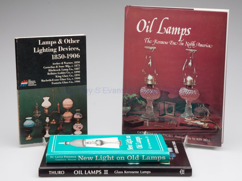 LIGHTING REFERENCE VOLUMES, LOT OF FOUR: LIGHTING REFERENCE VOLUMES, LOT OF FOUR, including "Oil Lamps" and "Oil Lamps II", Katherine Thuro, 1987 and 1983; and "New Light on Old Lamps", Larry Freeman, nd. One soft cover, the remaining hard c