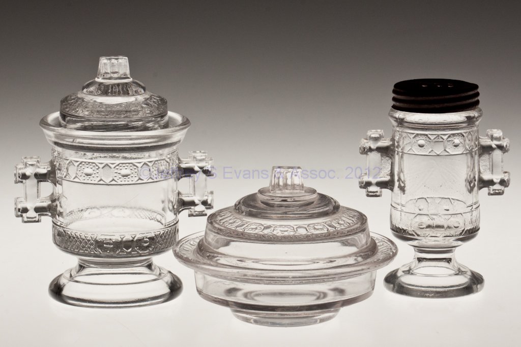 TWO BAND TOY TABLE ARTICLES, LOT OF TWO: TWO BAND TOY TABLE ARTICLES, LOT OF TWO, colorless, comprising a butter dish and covered sugar bowl. Together with a matching pattern salt shaker with period lid. Three pieces total. Fourth quarter 19