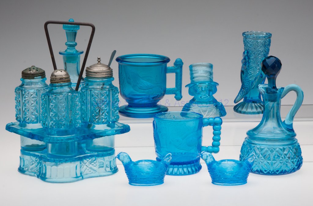 VARIOUS NOVELTY ARTICLES, LOT OF EIGHT: VARIOUS NOVELTY ARTICLES, LOT OF EIGHT, blue, including an Atterbury's Robin mug, a Bird on Branch mug, a Man in Top Hat toothpick holder, and a Duncan Cornucopia vase. Late 19th/early 20th century. 1