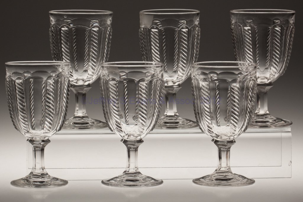 CABLE SET OF SIX LARGE GOBLETS: CABLE SET OF SIX LARGE GOBLETS, colorless lead glass. Third quarter 19th century. 6 3/8" to 6 1/2" H. Provenance: Lillian "Lil" and Walter "Bud" Marchant Collection/Lil-Bud Antiques.