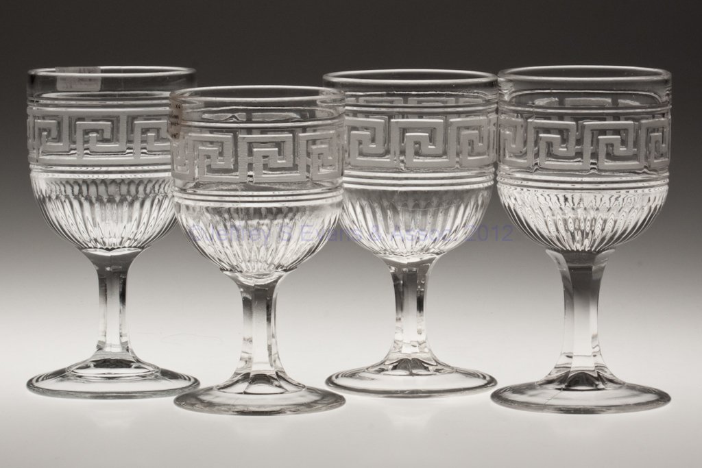 ROMAN KEY - FROSTED SET OF FOUR GOBLETS: ROMAN KEY - FROSTED SET OF FOUR GOBLETS, colorless lead glass. Third quarter 19th century. 5 3/4" to 6 1/8" H. Provenance: Lillian "Lil" and Walter "Bud" Marchant Collection/Lil-Bud Antiques.