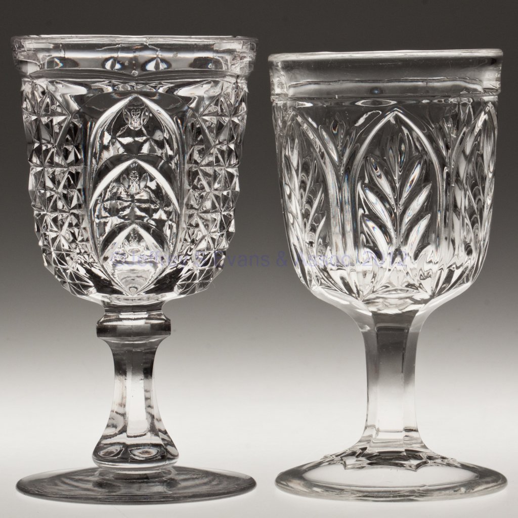 VARIOUS EAPG GOBLETS, LOT OF TWO: VARIOUS EAPG GOBLETS, LOT OF TWO, colorless lead glass, comprising an Arched Leaf and a Scarab with plain foot.. Third quarter 19th century. 6" and 6 1/4" H