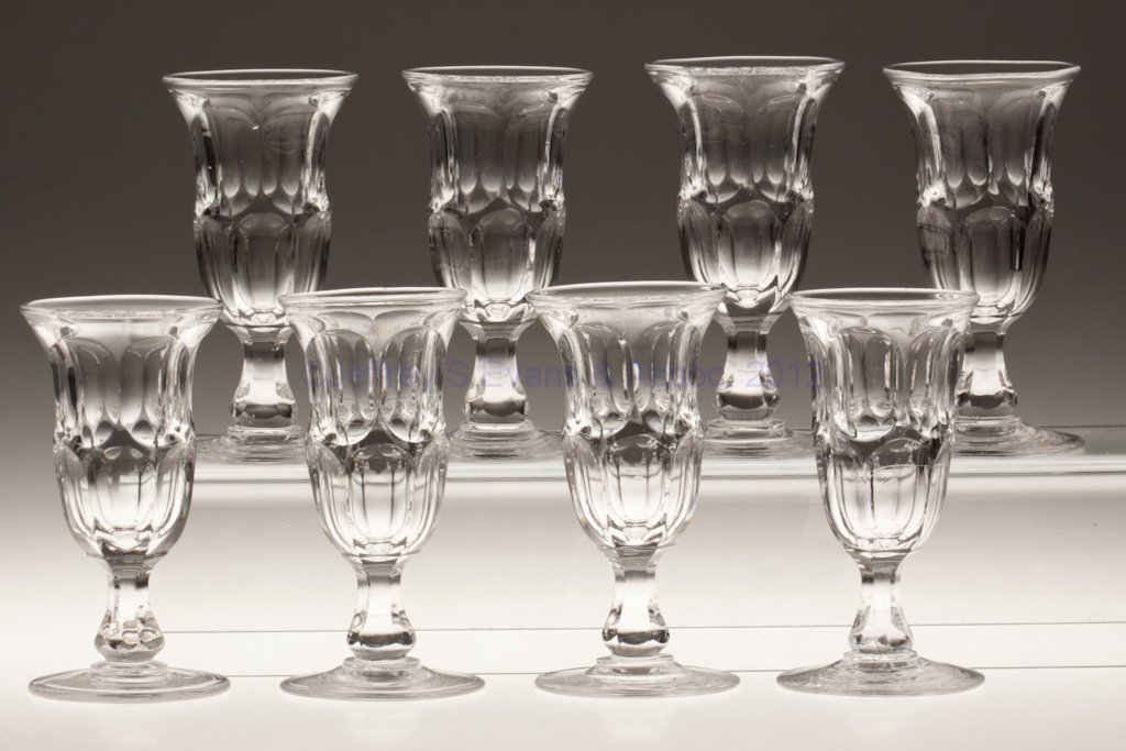 ASHBURTON SET OF EIGHT JELLY GLASSES: ASHBURTON SET OF EIGHT JELLY GLASSES, colorless lead glass, each with flared rim and polished pontil mark. Third quarter 19th century. 4 7/8" H. Provenance: From a Pennsylvania collection.