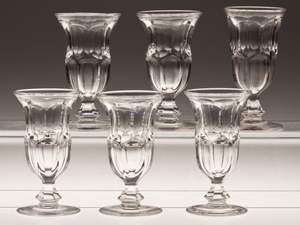 ASHBURTON ASSEMBLED SET OF SIX JELLY GLASSES: ASHBURTON ASSEMBLED SET OF SIX JELLY GLASSES, colorless lead glass, flared rim, sharp knop, five with polished pontil mark. Third quarter 19th century. 4" to 4 1/4" H. Provenance: From a Pennsylvania 