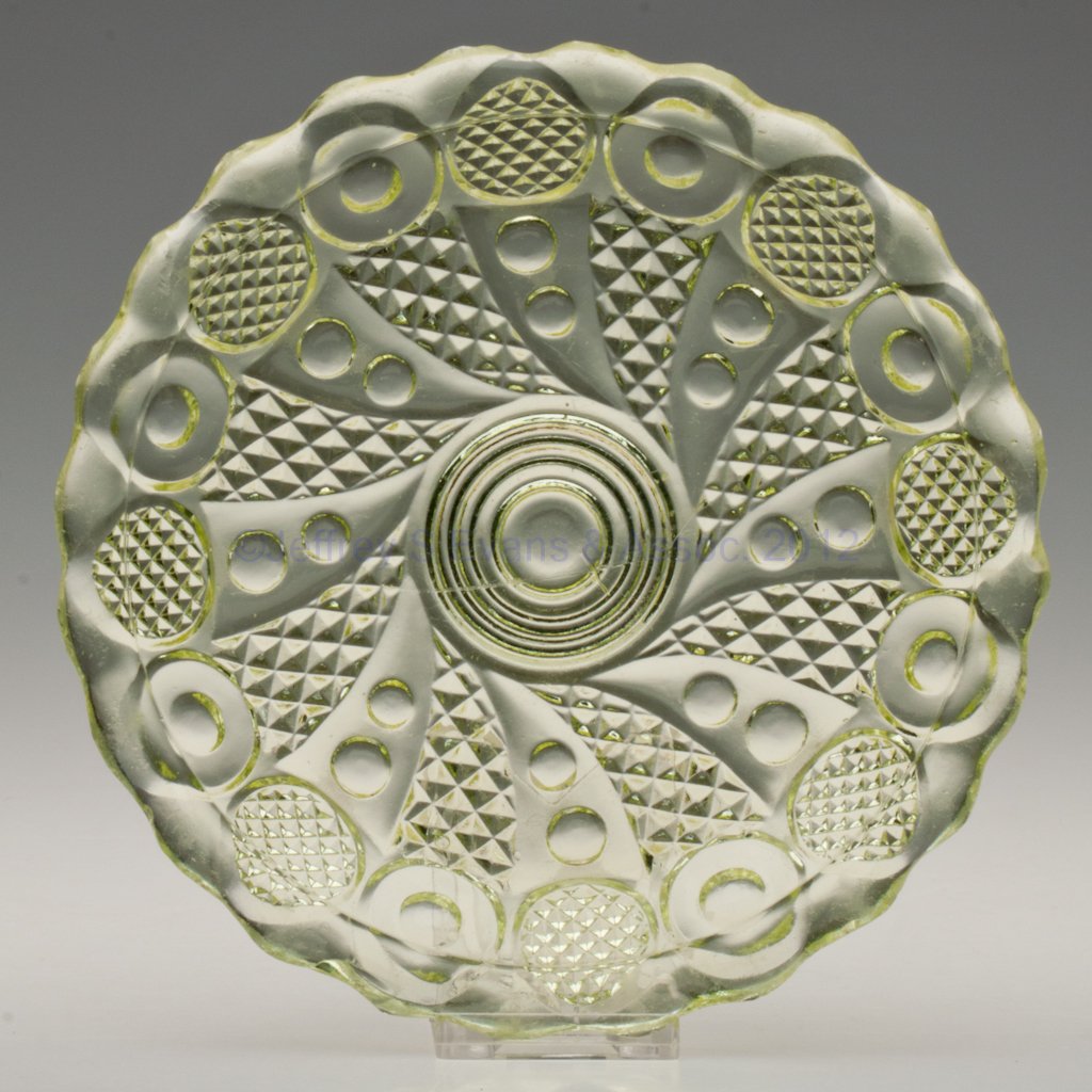 HORN OF PLENTY PLATE: HORN OF PLENTY PLATE, canary yellow, rim with 24 shallow scallops. Boston & Sandwich Glass Co. and others. Third quarter 19th century. 6 1/4" D. Provenance: Personal collection of Judith (Judy) Cronin