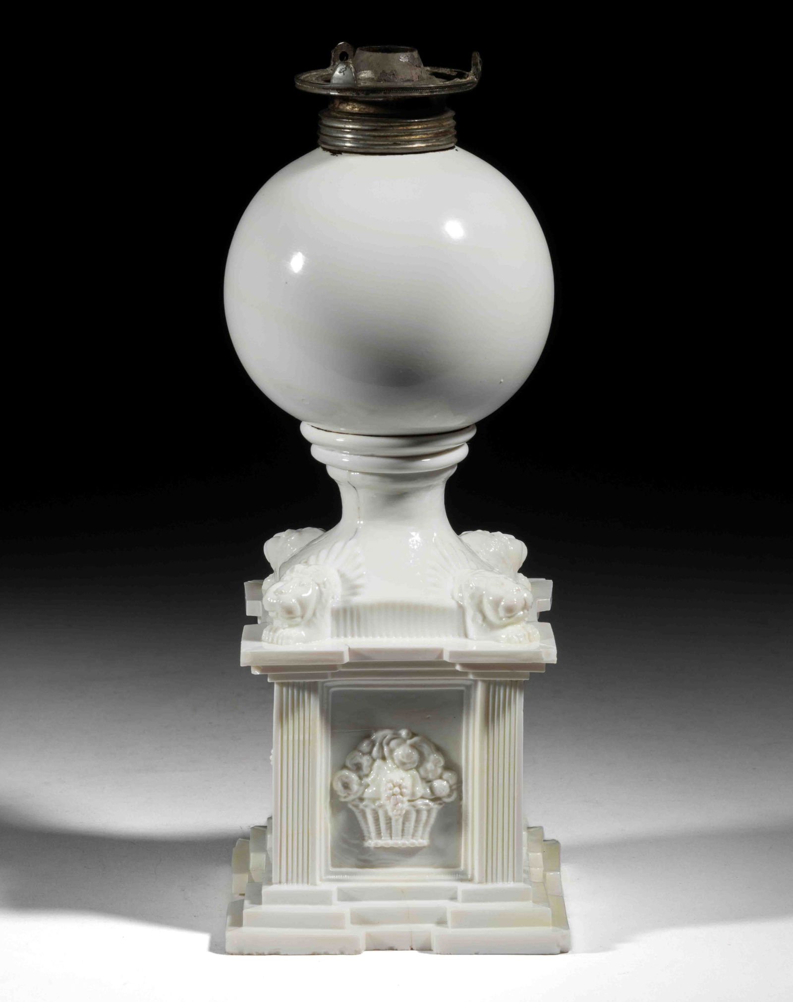 FREE-BLOWN AND PRESSED LION MONUMENT BASE WHALE OIL / FLUID STAND LAMP: FREE-BLOWN AND PRESSED LION MONUMENT BASE WHALE OIL / FLUID STAND LAMP, opaque white, spherical font resting on a beehive wafer, raised on a Lion monument base, having the original pewter collar. Fitt