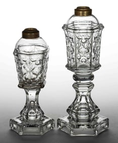 ARMORIAL PRESSED GLASS WHALE OIL / FLUID STAND LAMPS, LOT OF TWO