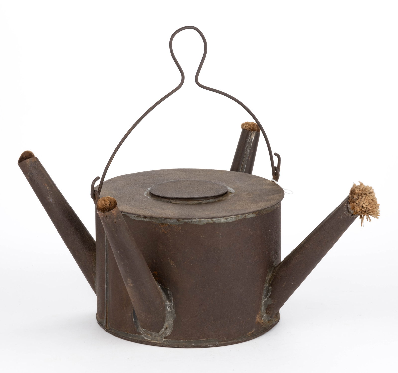 SHEET-IRON / TIN FOUR-SPOUT SHOP / TORCH LAMP: SHEET-IRON / TIN FOUR-SPOUT SHOP / TORCH LAMP, cylinder-form with four spouts, flat top with cover and a bail handle. 19th century. 8" HOA, 17 1/2" DOA. Provenance:
