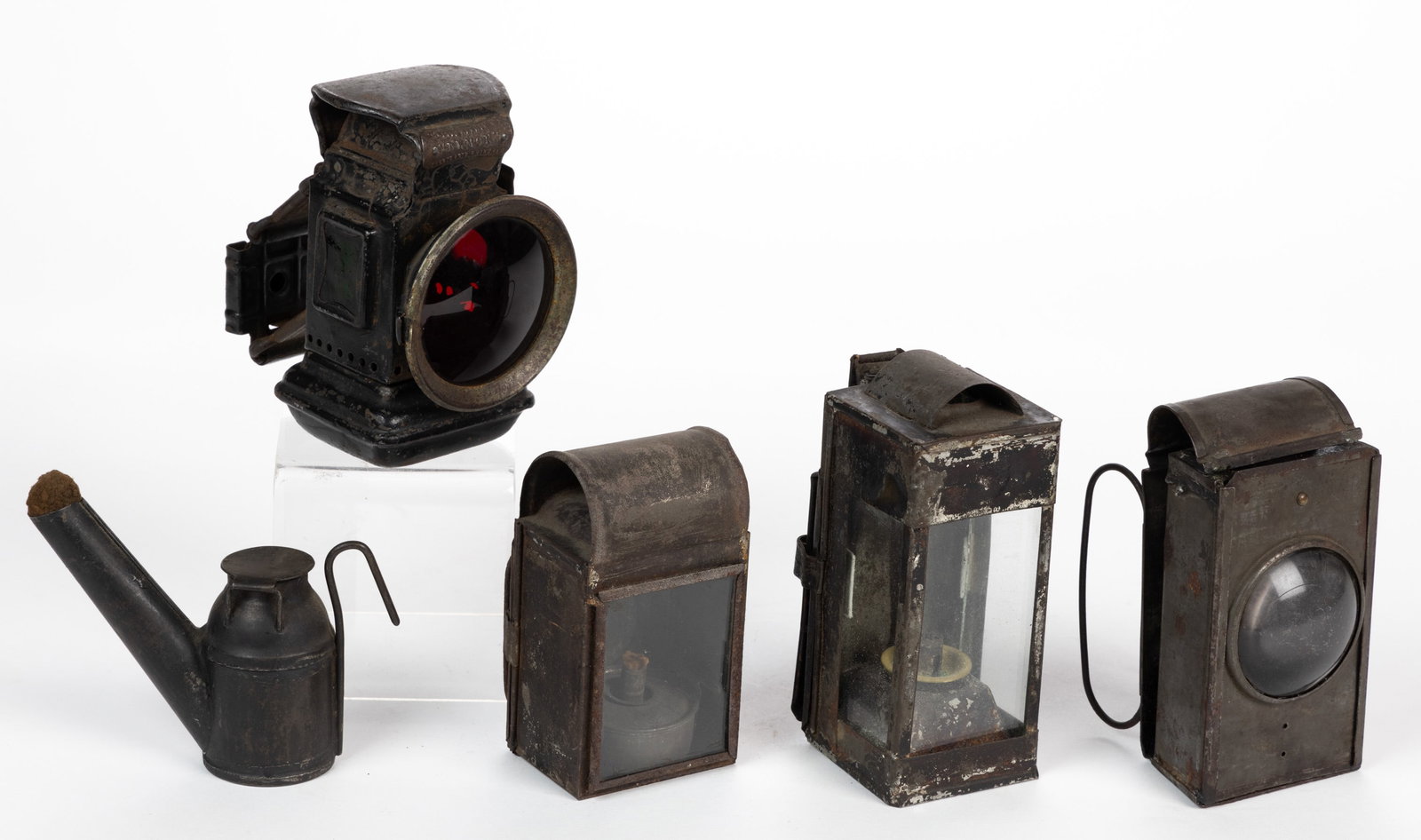ASSORTED SHEET-IRON OIL BURNING LANTERNS, LOT OF FIVE: ASSORTED SHEET-IRON OIL BURNING LANTERNS, LOT OF FIVE, comprising three square-form examples with handles, two examples fitted with a hinged door and colorless glass pane, remaining with a sliding doo