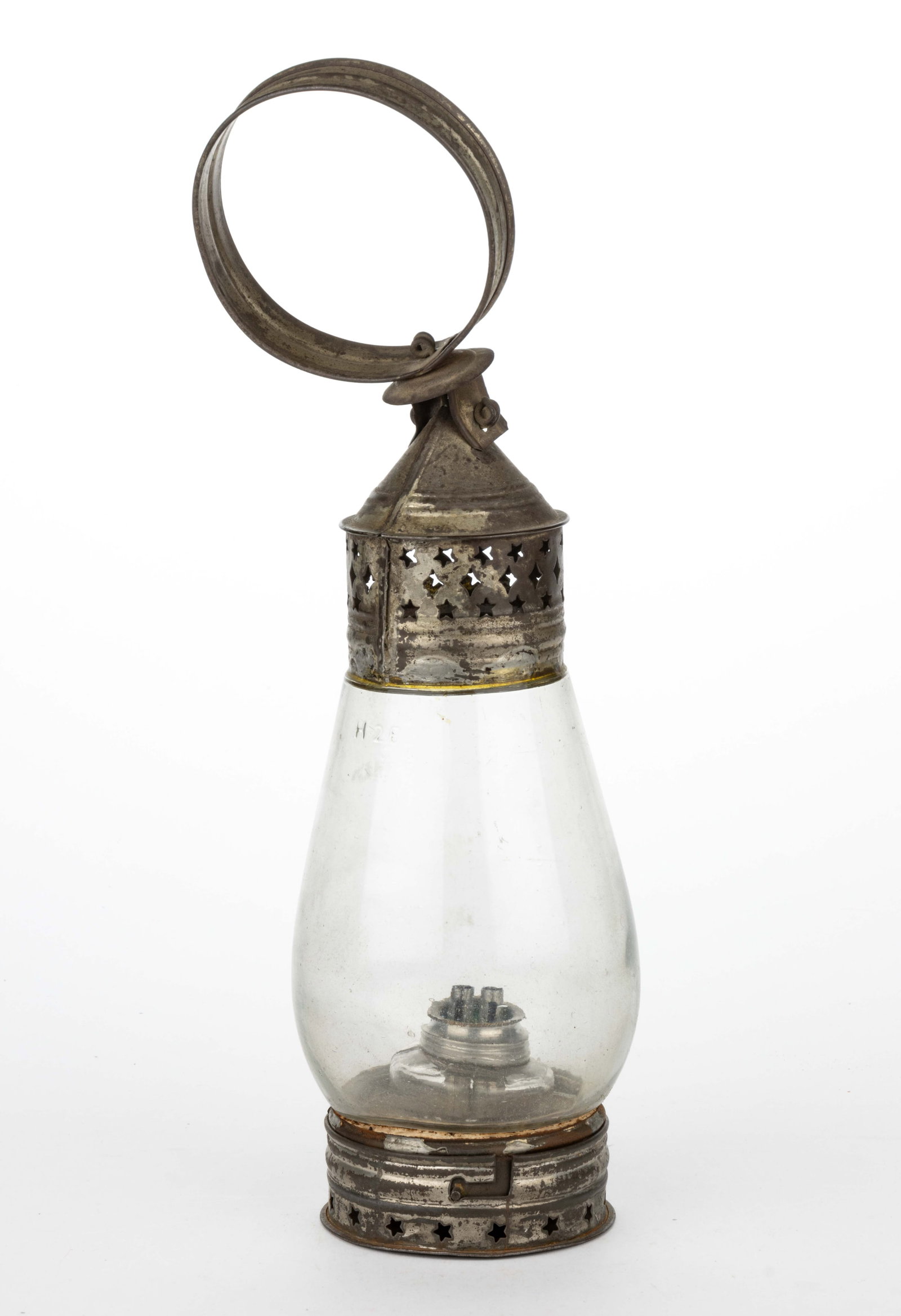 PIERCED AND PUNCHED SHEET-IRON / TIN WHALE OIL LANTERN: PIERCED AND PUNCHED SHEET-IRON / TIN WHALE OIL LANTERN, colorless fixed blown-molded bulge-form globe embossed "H26", conical form cap and ring handle, removable base with bayonet mecha