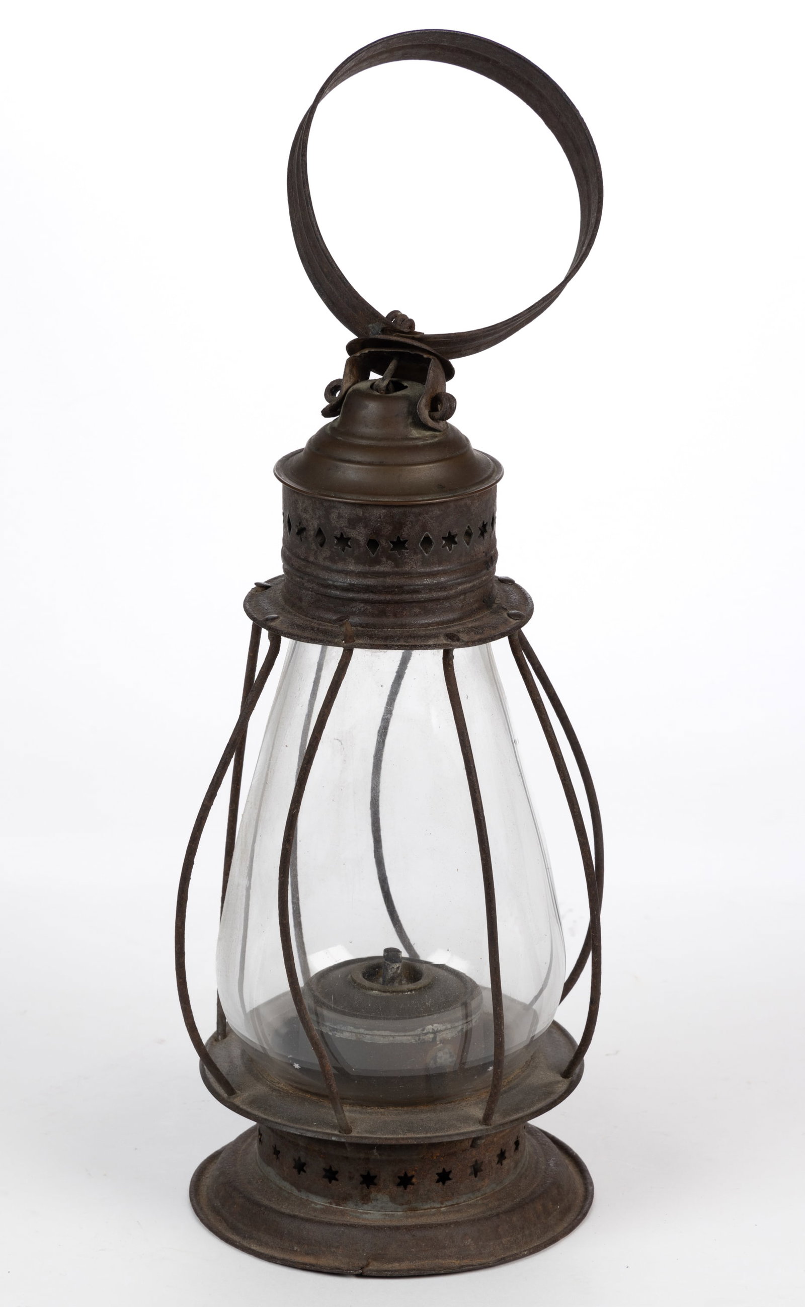 BRASS AND SHEET-IRON PIERCED AND PUNCHED WHALE OIL LANTERN: BRASS AND SHEET-IRON PIERCED AND PUNCHED WHALE OIL LANTERN, colorless tapered-form fixed globe with eight wire guards, brass cap over a diamond and stars patterned sheet iron band, large strap&nb