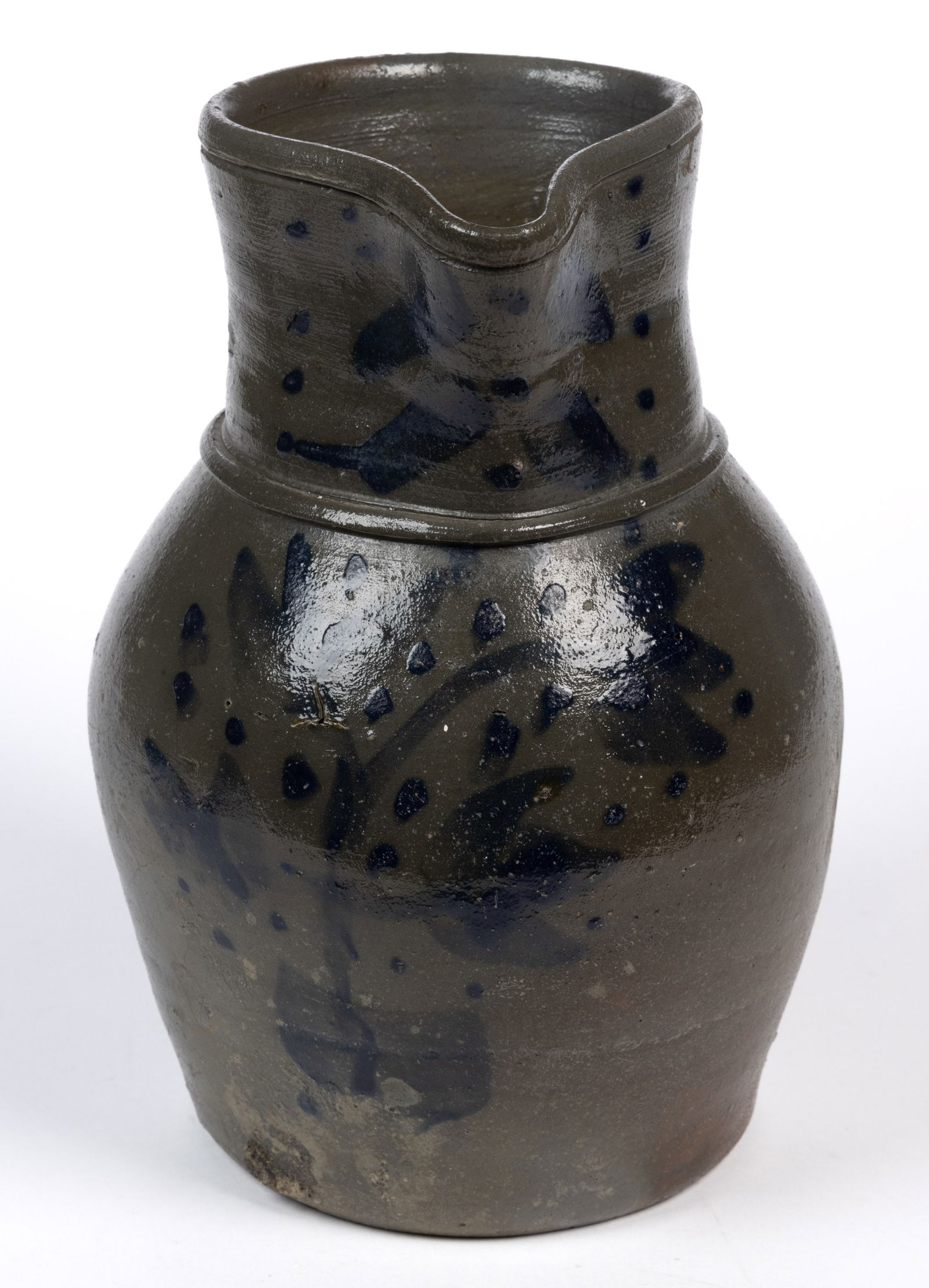 SOUTHWESTERN VIRGINIA / EASTERN TENNESSEE DECORATED STONEWARE PITCHER: SOUTHWESTERN VIRGINIA / EASTERN TENNESSEE DECORATED STONEWARE PITCHER, salt-glazed, approximately one-gallon capacity, ovoid form with incised ring below rim, beaded shoulder ring, and applied gr