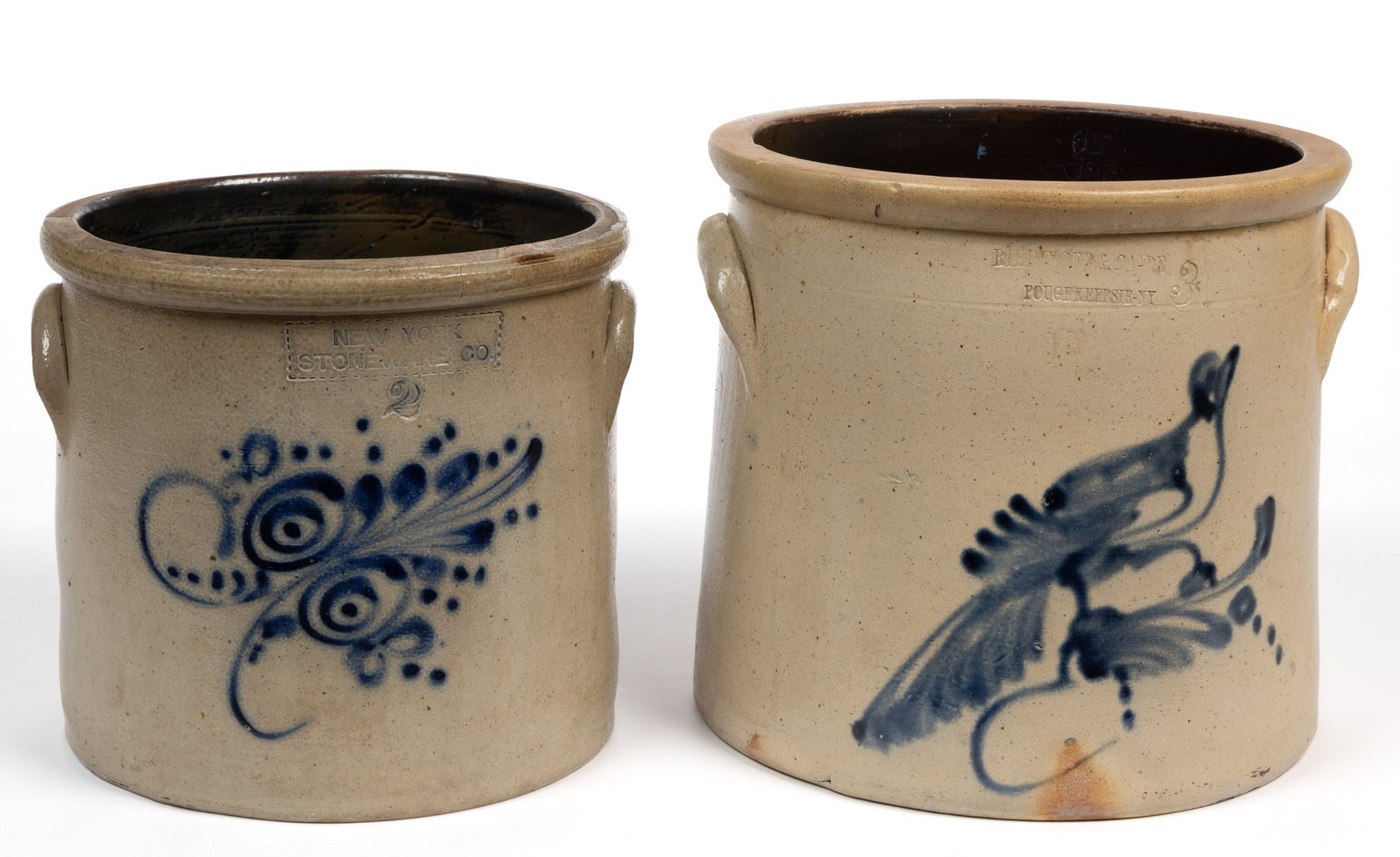 STAMPED NEW YORK DECORATED STONEWARE CROCKS, LOT OF TWO: STAMPED NEW YORK DECORATED STONEWARE CROCKS, LOT OF TWO, salt-glazed, each of wide-mouth cylindrical form with flat-top rounded rim, applied arched handles, Albany-slip glazed interior, comprising a&n