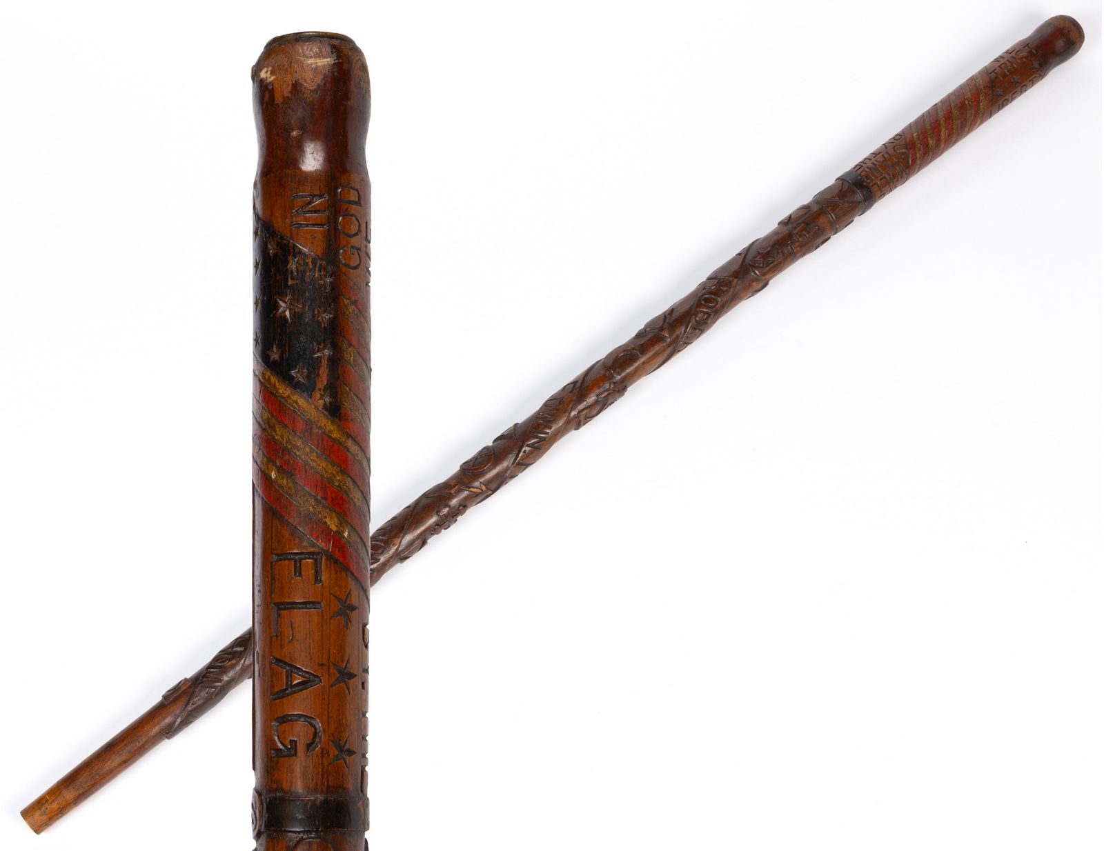EDWIN H. SMITH (VIRGINIA, 1813-1891) ATTRIBUTED, FOLK ART CARVED CANE / WALKING STICK: EDWIN H. SMITH (VIRGINIA, 1813-1891) ATTRIBUTED, FOLK ART CARVED CANE / WALKING STICK, featuring a handle with a pressed brass button and an eagle surrounded by "N H D V S", abbrev