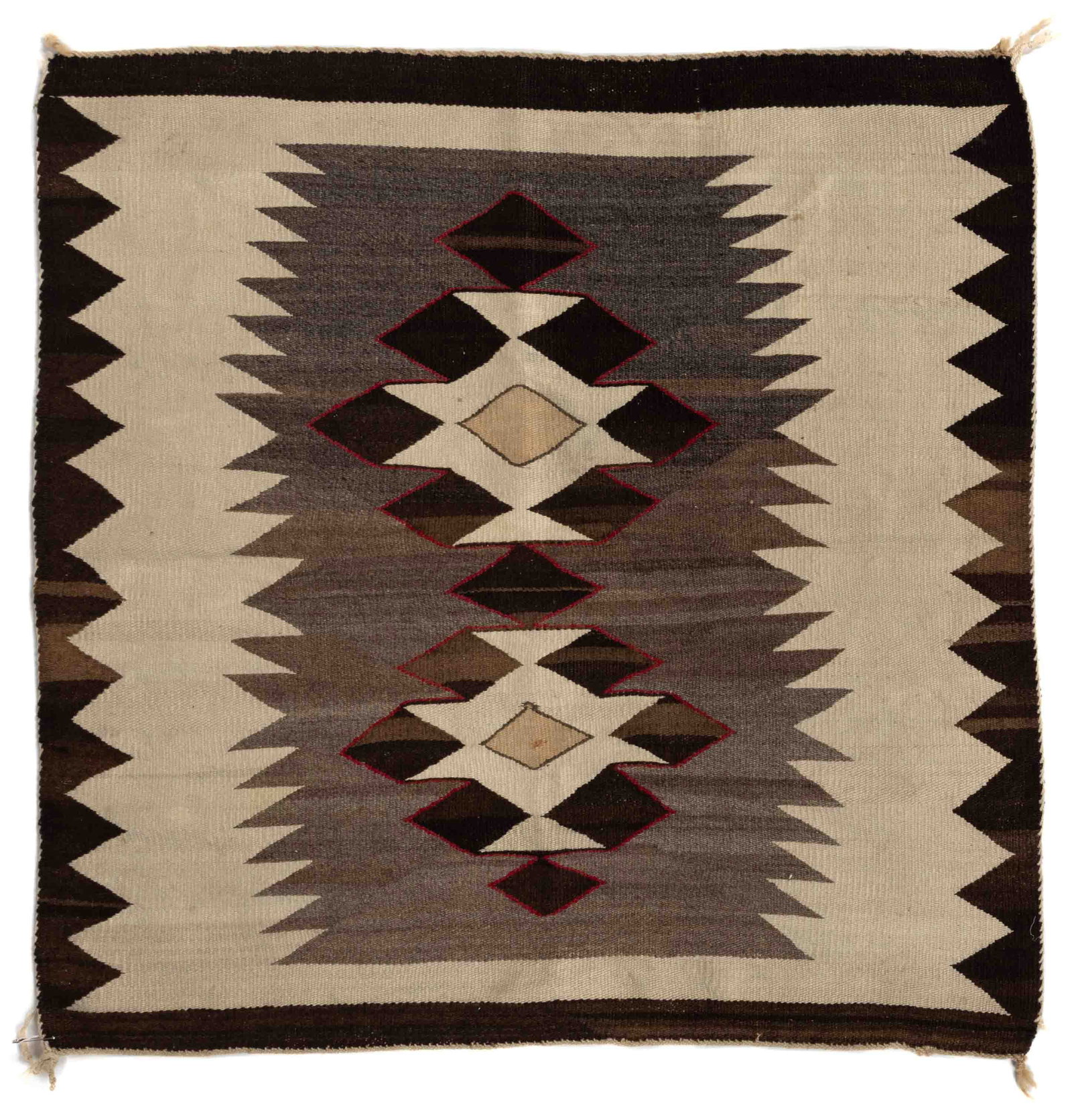 NATIVE AMERICAN NAVAJO WOOL WEAVING / RUG: NATIVE AMERICAN NAVAJO WOOL WEAVING / RUG, colors comprising black-brown, white, brown, red, and light yellow, having two central diamond motifs in a serrated edge field, encompassed by double border 