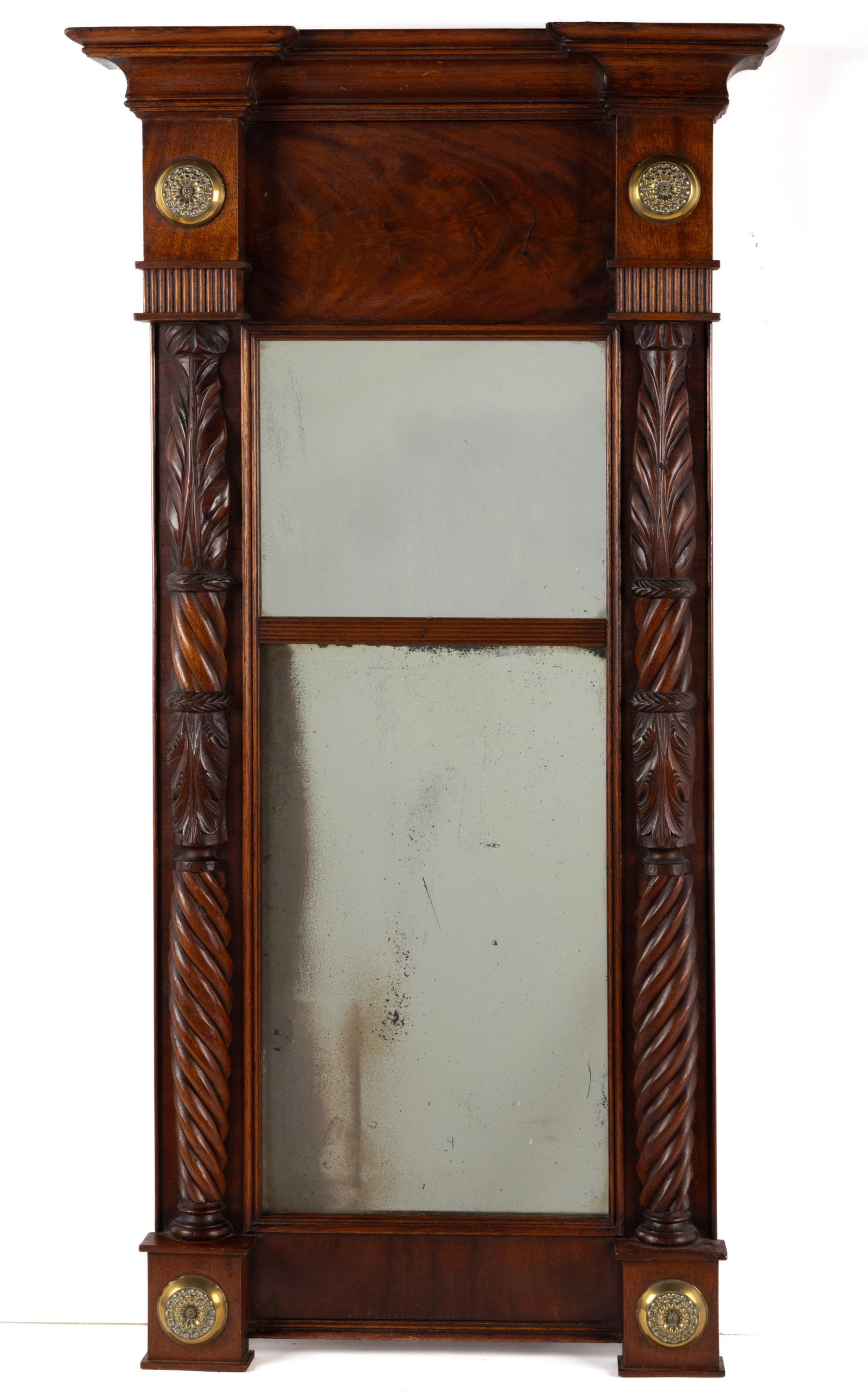 AMERICAN FEDERAL CARVED MAHOGANY LOOKING GLASS / WALL MIRROR: AMERICAN FEDERAL CARVED MAHOGANY LOOKING GLASS / WALL MIRROR, the overhanging molded cornice above a veneered panel of figured mahogany over two mirrored panels separated by a reeded divider, the whol