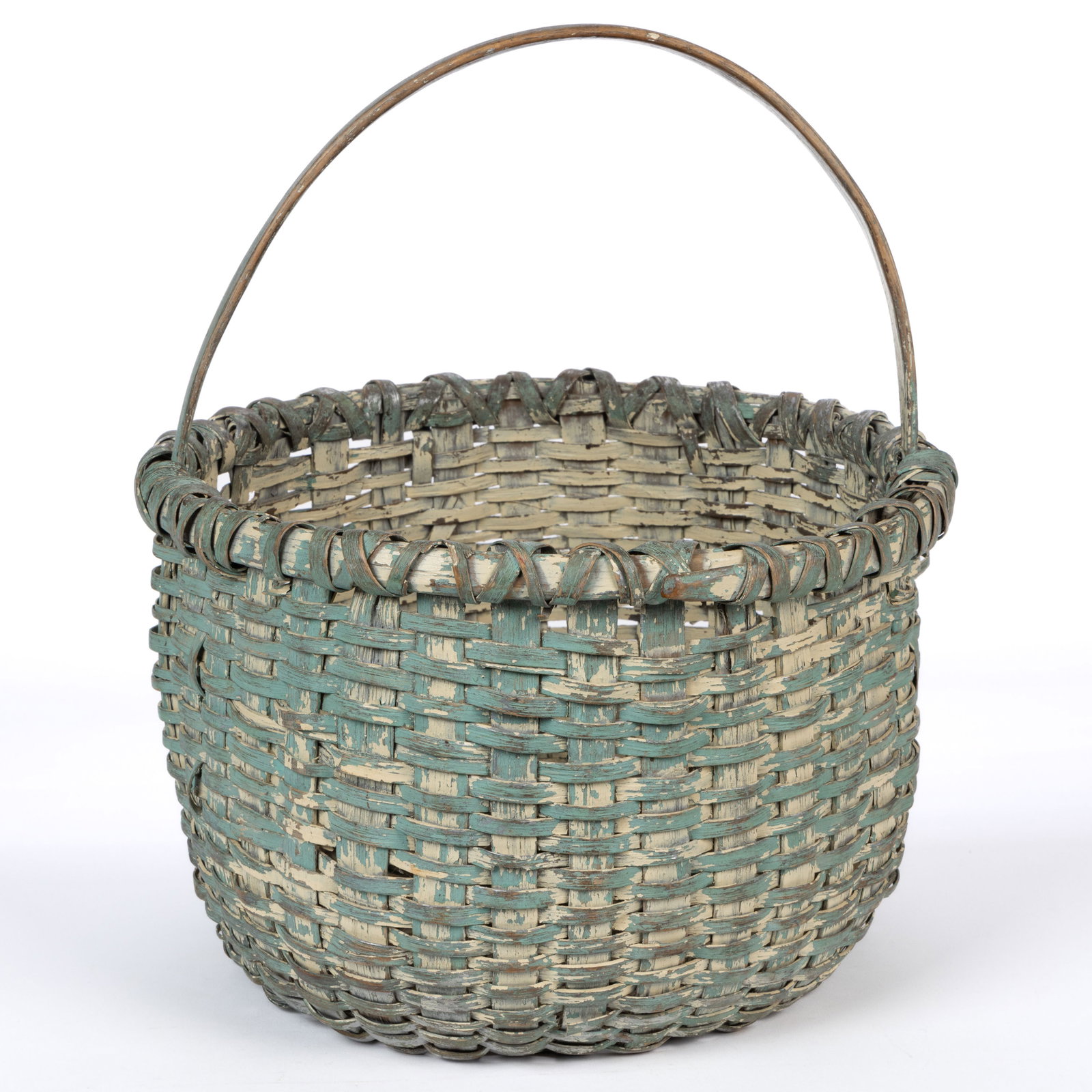MID-ATLANTIC PAINTED STAVE-TYPE WOVEN-SPLINT BASKET: MID-ATLANTIC PAINTED STAVE-TYPE WOVEN-SPLINT BASKET, white oak, circular-form with high sides, arched handle, cross-wrapped rim with long tie-in into the sides, kick-up bottom, and x-wrapped lash