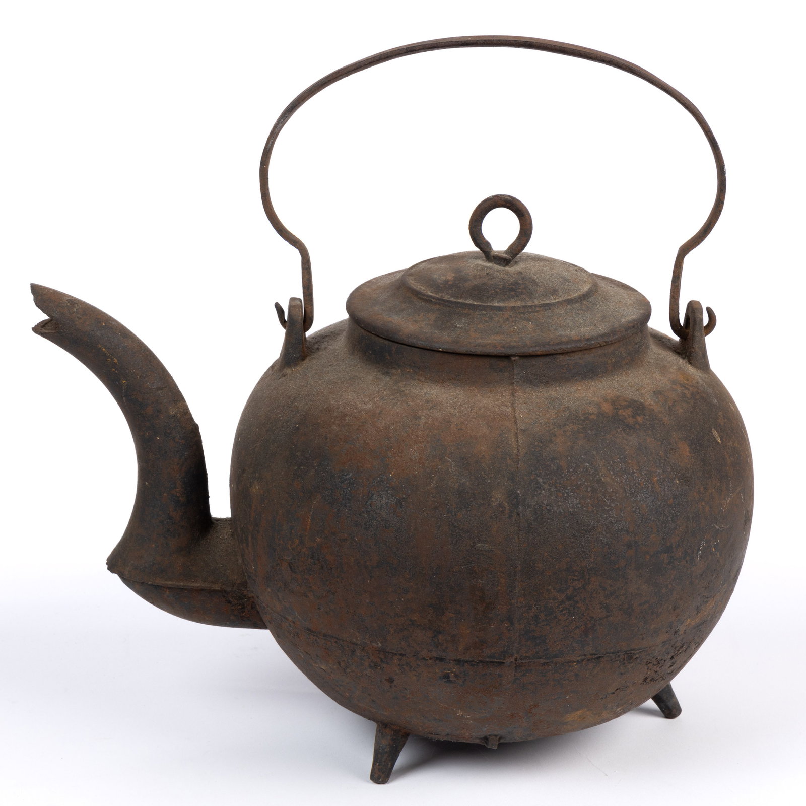 SHENANDOAH VALLEY OF VIRGINIA, POSSIBLY PAGE CO., CAST-IRON HOT WATER / TEA KETTLE: SHENANDOAH VALLEY OF VIRGINIA, POSSIBLY PAGE CO., CAST-IRON HOT WATER / TEA KETTLE, globular body with gooseneck spout and bail handle, raised on three feet, original cover with iron-ring finial. Foun