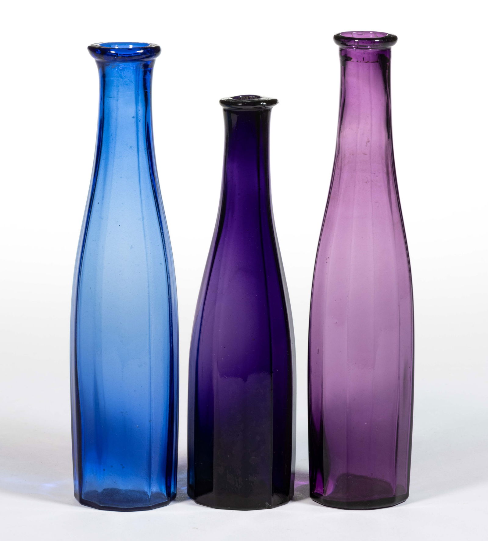 BLOWN-MOLDED PANELLED COMMERCIAL COLOGNE BOTTLES, LOT OF THREE (1 of 1)