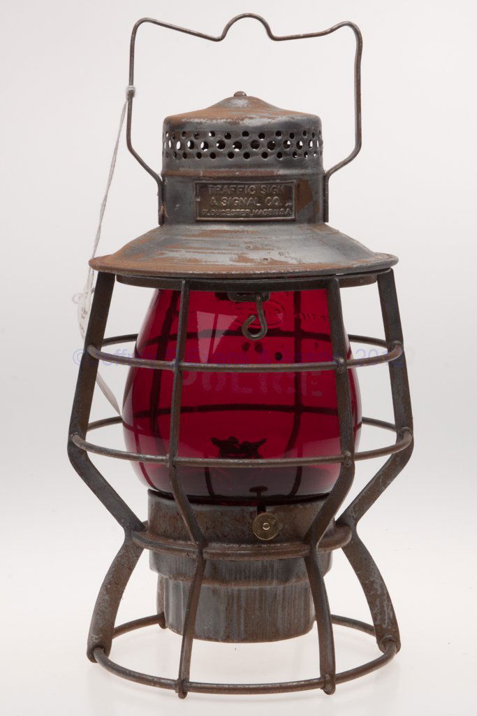 TRAFFIC SIGN & SIGNAL CO. SHEET IRON POLICE LANTERN: TRAFFIC SIGN & SIGNAL CO. SHEET IRON POLICE LANTERN, bail handle, brass maker's plate marked "TRAFFIC SIGN & SIGNAL CO. / GLOUCESTER, MASS U.S.A.", hinged cap, removable globe etched "POLICE" and embo