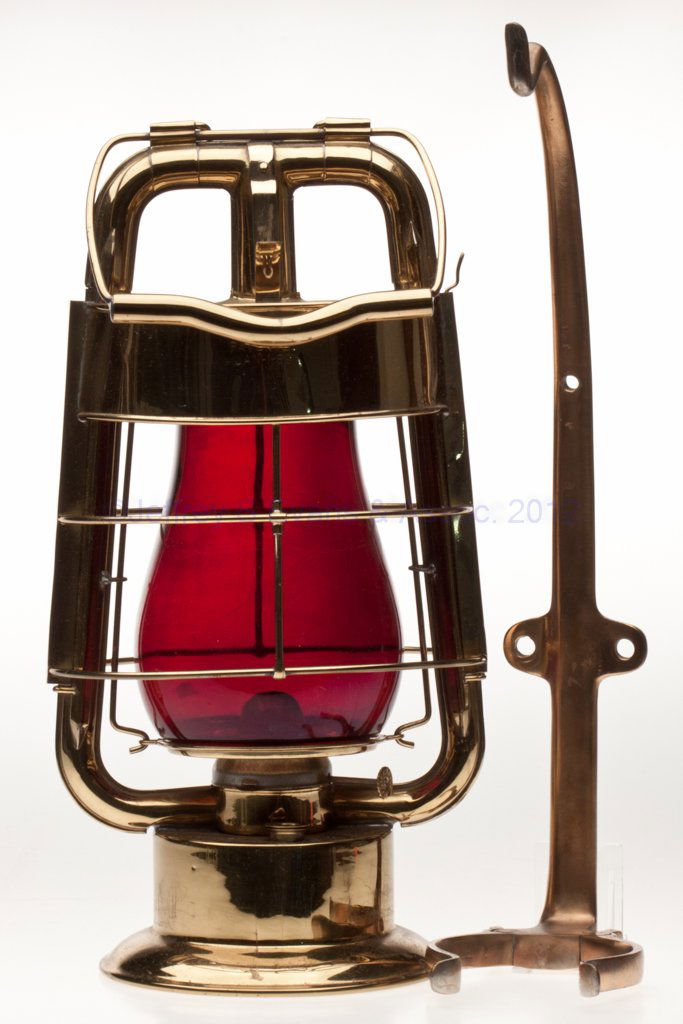 DIETZ "KING" FIRE DEPARTMENT BRASS HOT BLAST TUBULA: DIETZ "KING" FIRE DEPARTMENT BRASS HOT BLAST TUBULAR LANTERN WITH BRACKET, polished, bail handle and apparatus hook, wind guard marked "PATENTED JAN-1-89" to each side, font embossed "DIETZ KING" and