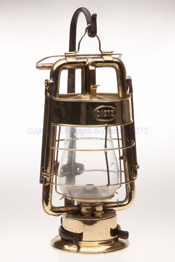 DIETZ "KING" FIRE DEPARTMENT BRASS HOT BLAST TUBULA: DIETZ "KING" FIRE DEPARTMENT BRASS HOT BLAST TUBULAR LANTERN WITH WROUGHT IRON BRACKET, polished, bail handle and apparatus hook, wind guard embossed "DIETZ" to each side and "PATENTED AUG. 27.07" to