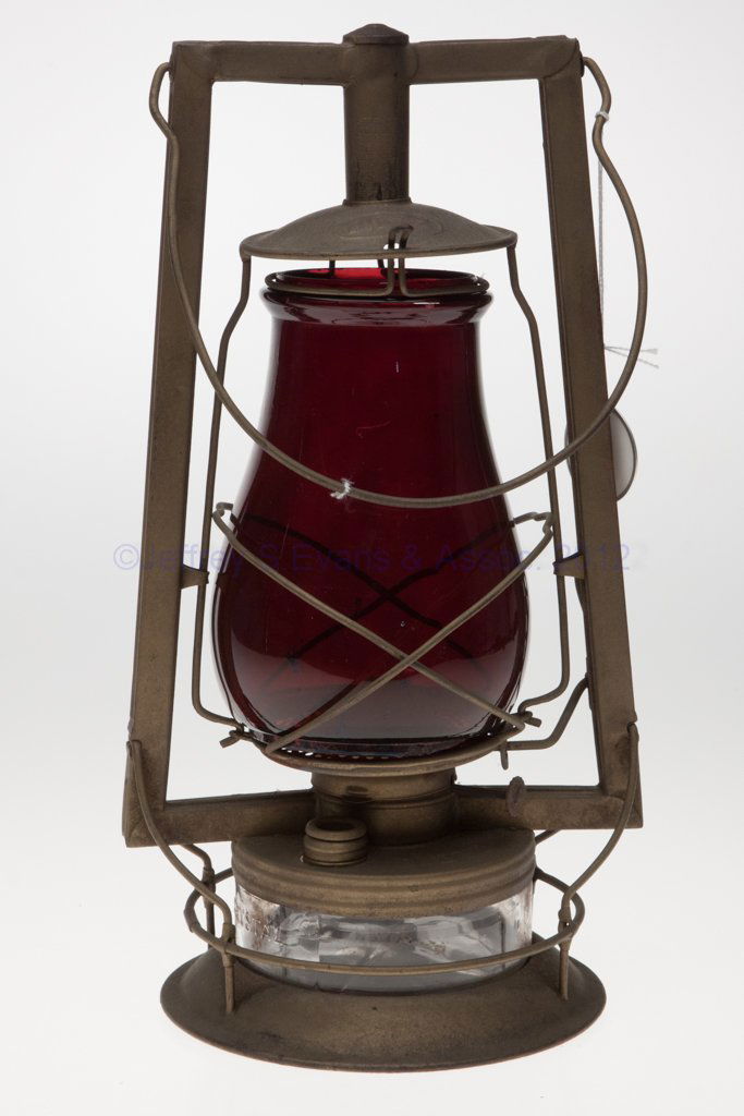 DIETZ "CRYSTAL" SHEET IRON HOT BLAST TUBULAR LANTER: DIETZ "CRYSTAL" SHEET IRON HOT BLAST TUBULAR LANTERN, brass finish, bail handle, cover embossed "DIETZ", central tube marked with various patent dates, colorless glass font embossed "DIETZ CRYSTAL", t