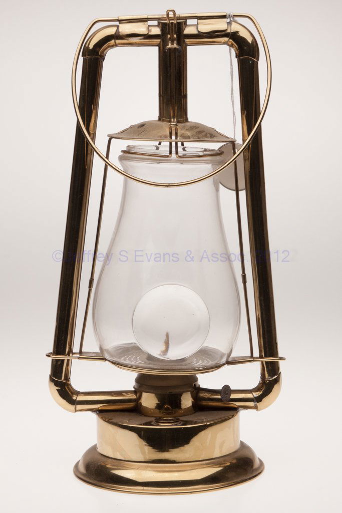 STEAM GAUGE & LANTERN CO. "L. W." BRASS HOT BLAST T: STEAM GAUGE & LANTERN CO. "L. W." BRASS HOT BLAST TUBULAR LANTERN WITH BULL'S-EYE LENS, bail handle, top of font marked "TUBULAR / L W" and with side-refill feature, underside of base with various pat