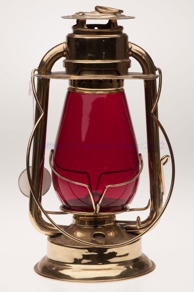 C. T. HAM MANUFACTURING CO. "GEM" BRASS COLD BLAST: C. T. HAM MANUFACTURING CO. "GEM" BRASS COLD BLAST TUBULAR LANTERN, polished, bail handle, top of font impressed "HAM'S GEM. COLD BLAST. ROCHESTER. N.Y. U. S. A.." and with side-refill feature, red/ru