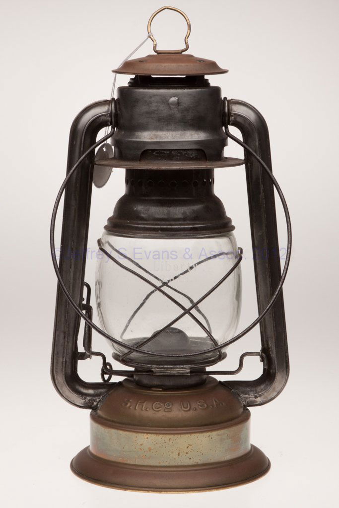 SIMMONS HARDWARE CO. "SIMMONS LIBERTY" BRASS AND SH: SIMMONS HARDWARE CO. "SIMMONS LIBERTY" BRASS AND SHEET IRON COLD BLAST TUBULAR LANTERN, bail handle, font embossed "S. H. CO U. S. A.", and reverse "SIMMONS LIBERTY", side-refill feature, colorless gl