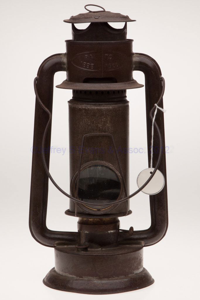 DEFIANCE LANTERN CO. SHEET IRON "AUTO" COLD BLAST: DEFIANCE LANTERN CO. SHEET IRON "AUTO" COLD BLAST TUBULAR LANTERN, bail handle, cap embossed "PATD 1898 1900" and reverse "DEFIANCE PATENTED 1899", central chamber fitted with a 2 3/8" D lens and mark